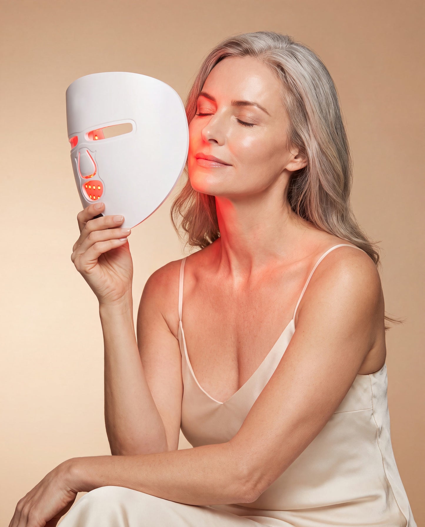 Lumière red light glowing against the skin